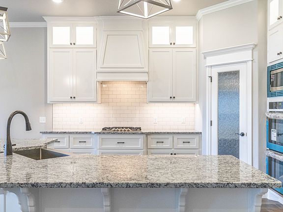 Homes by Taber Mallory Floor Plan with Brick-5025 Sunspear