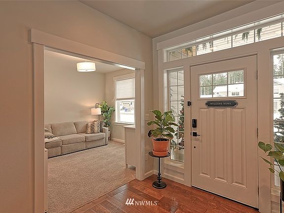 Office/ Den space located to the right as you walk in. Leave the open pass through feeling or add french doors for a more private space. Ideal play room or work from home.
