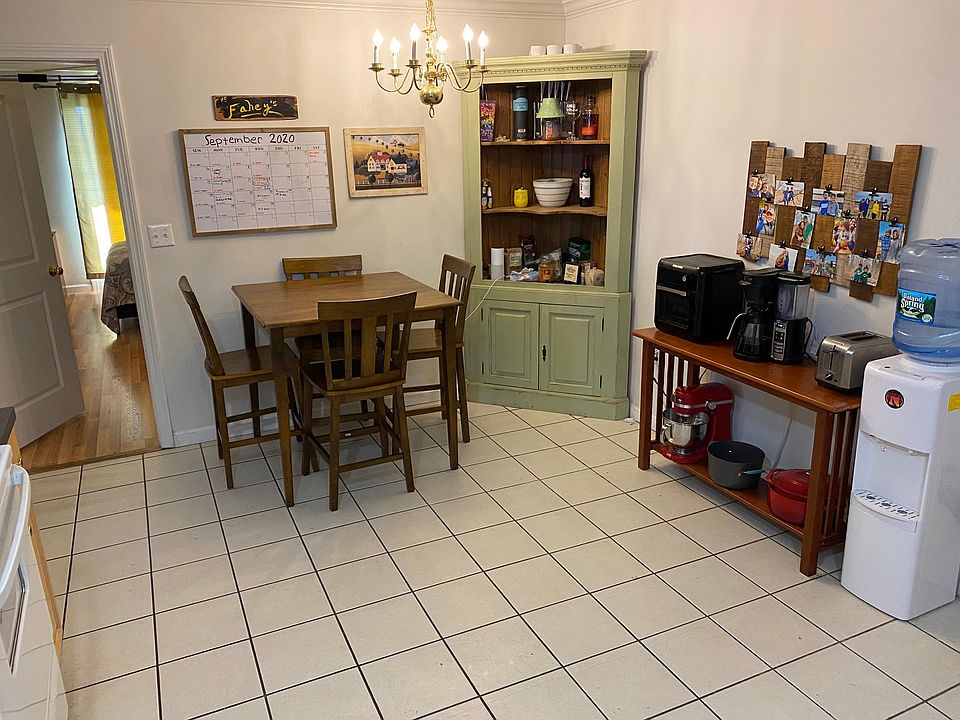 A spacious area for a dining table next to the kitchen.
