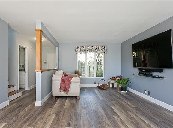 Newly painted living area with newer window.