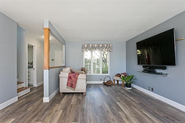 Newly painted living area with newer window.