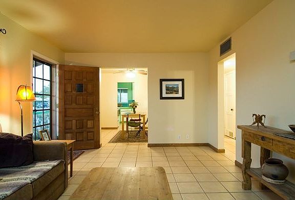 Looking through the dining room to the kitchen beyond