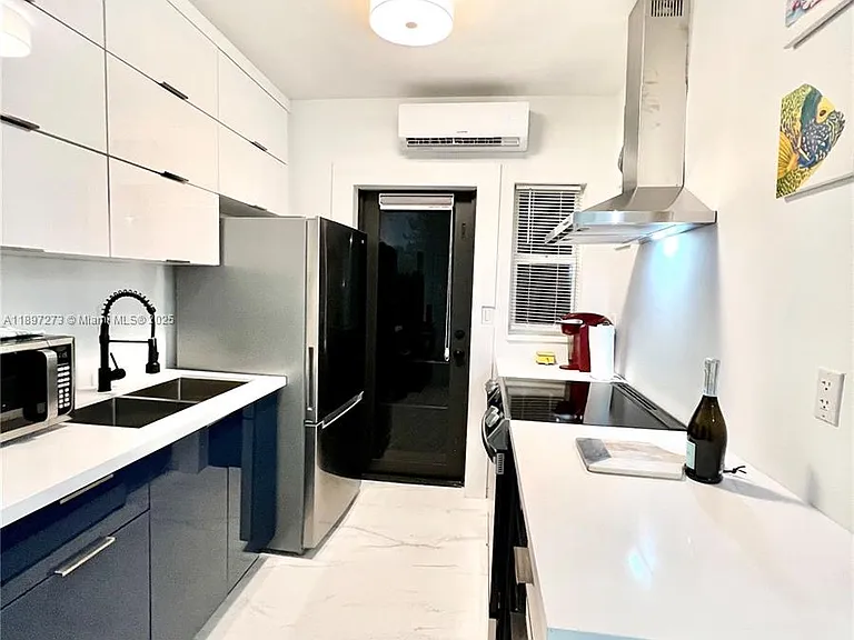 8270 NE 1st Pl — Photo 31