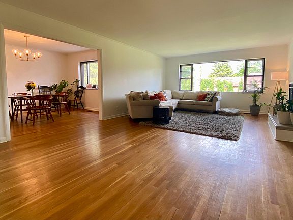 Family living room leads into dining room.