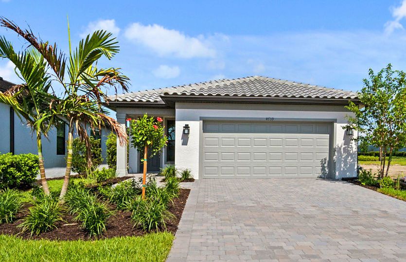 Welcoming exterior of this home with impact glass windows