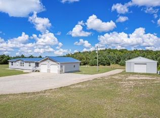 6900 Parmater Rd, Elmira, MI 49730