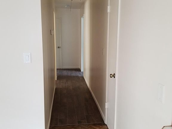 Hallway with porcelain floor