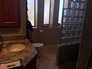 Powder Room with snail shower natural light