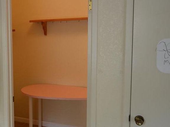 Large walk-in pantry next to kitchen