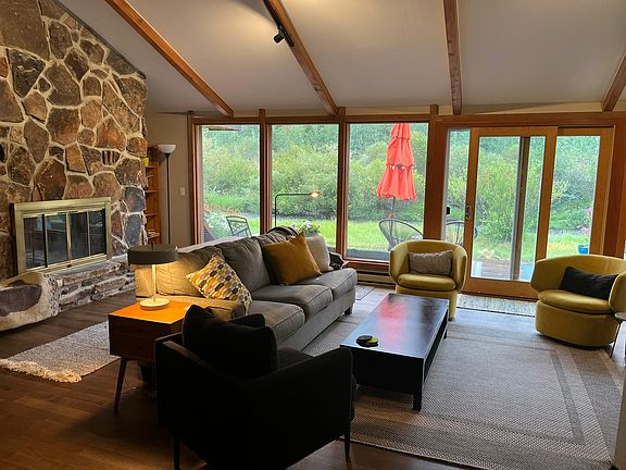 I call this the rec room as this is where everyone congregates for the view and connection to the kitchen.