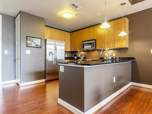 2nd image of 711 Cosmopolitan Dr NE Unit 722