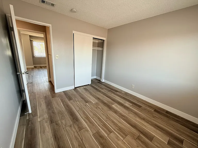Bedroom 3 with new paint and flooring