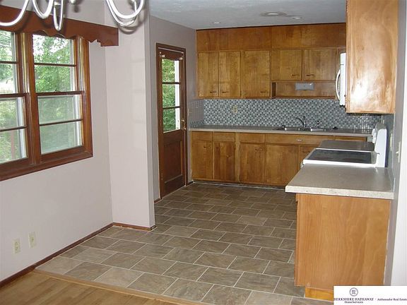 Open Concept.  New counters, ceramic tile floor. Includes Stove and dishwasher.