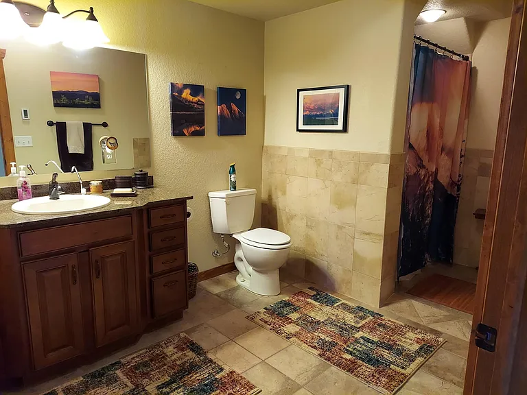 Large bathroom with walk in shower.