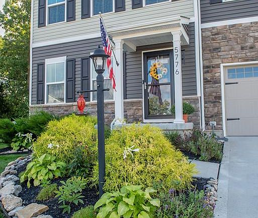 Inviting Covered Front Porch, Larson Storm Door w/Retractable Screen.