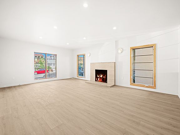 Entry/Living Room with decorative fireplace
