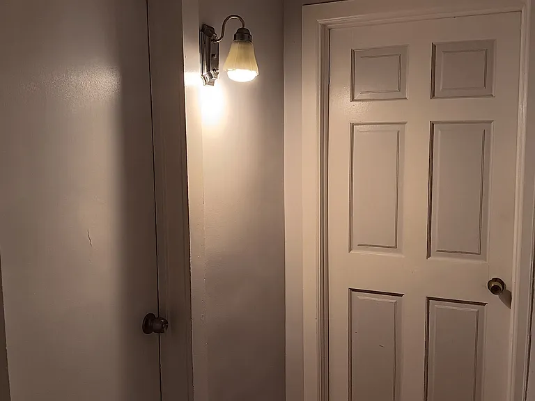 Hallway with Door to Master's and 1 Full Bathroom