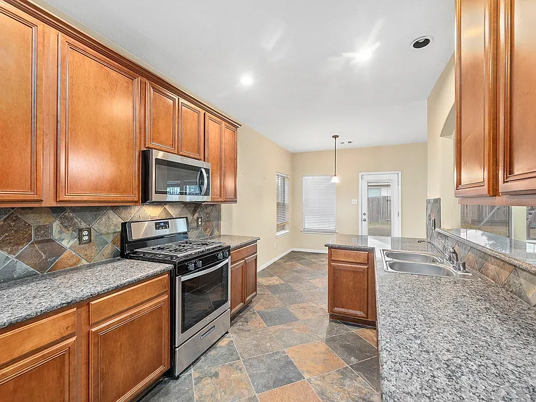 10003 Lynette Falls Dr — Photo 14