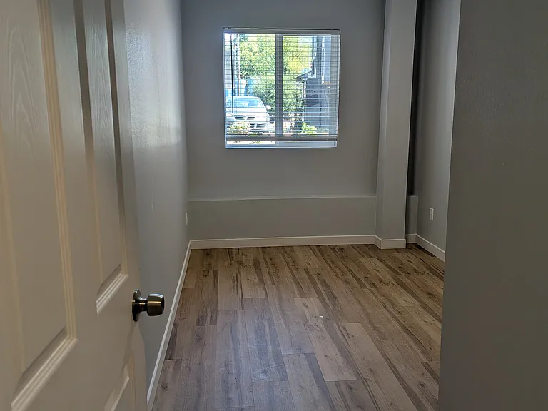 This is the first bedroom when you walk into the unit.