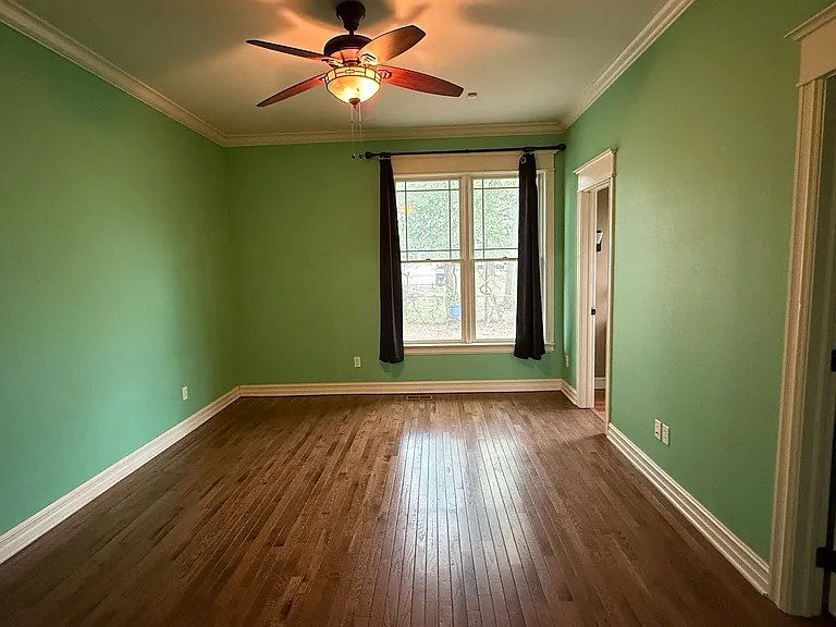 Primary bedroom on 1st floor with large walk-in closet