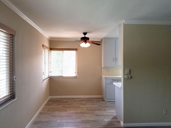Dining room with kitchen to the right.
