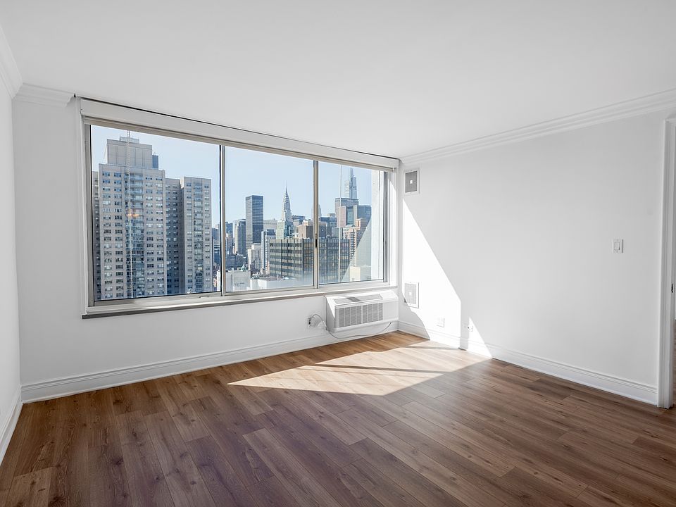 Living spaces with renovated finishes and scenic views