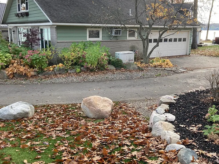Northwest side of home and garage