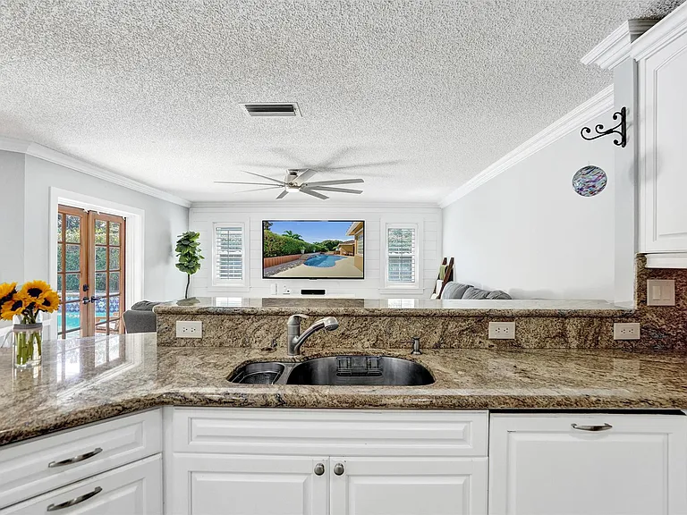 4142 NW 58th Dr — Photo 21