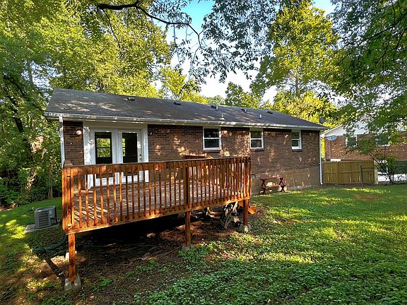 Beautiful deck with shade trees.