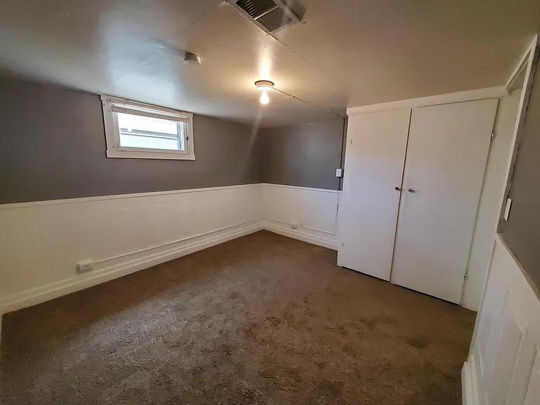 Bedroom #1. Built-in closet so you don't have to buy a dresser!