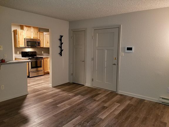 From Living room looking at front door & kitchen