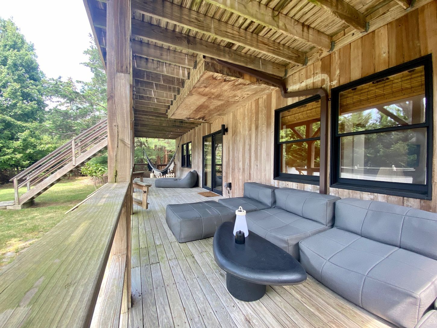 Downstairs Deck with Hammock and Seating Area