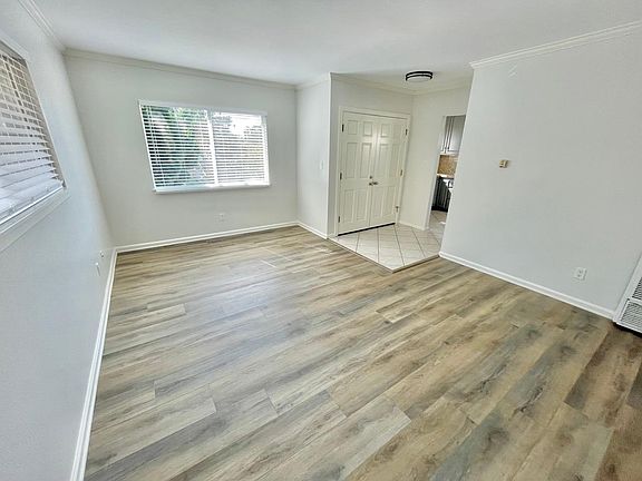 Living room has new plank floors
