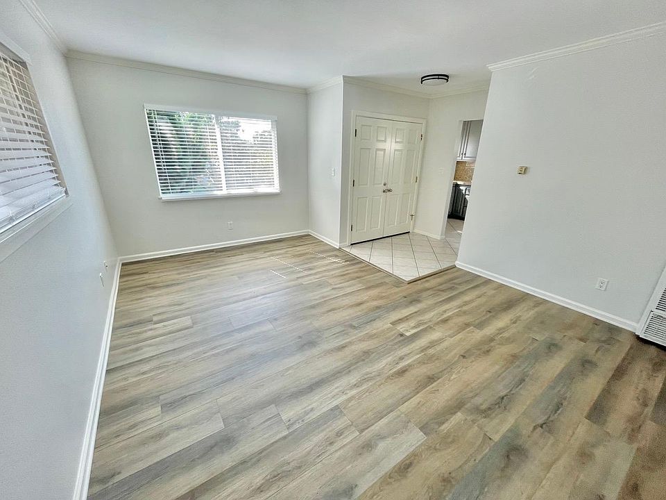 Living room has new plank floors