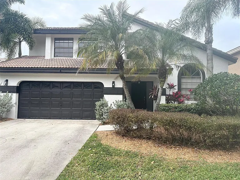 10461 NW 12th Ct — Photo 21