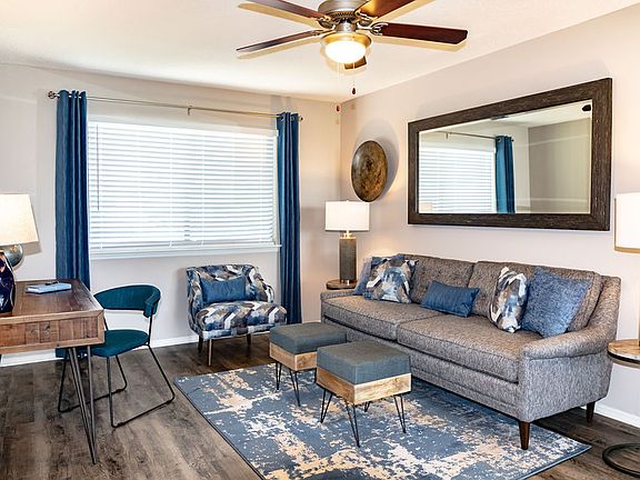 Large furnished living room at Forest Ridge apartments for rent in North Macon, GA