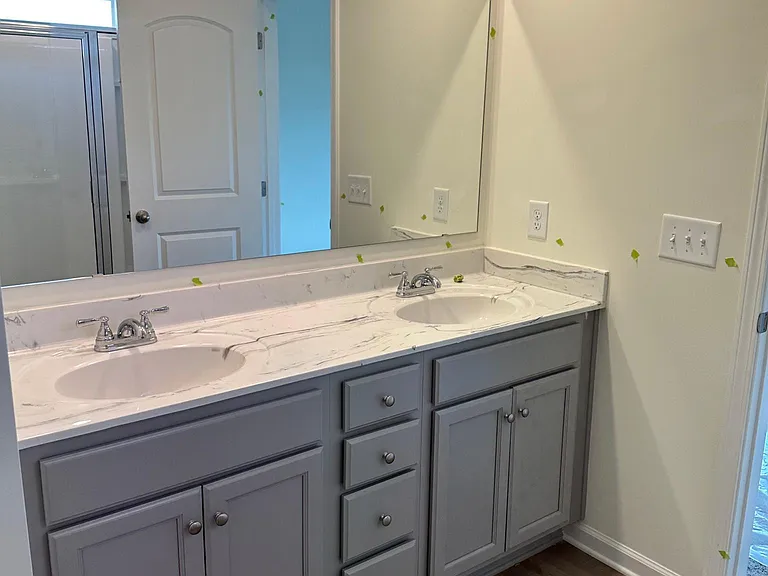 Master bath double vanity with grey cabinets