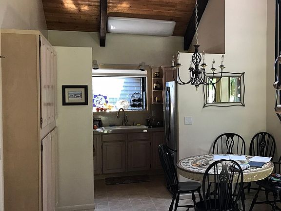 Small but very efficient kitchen/dining area with good storage. Sorry, no dishwasher.