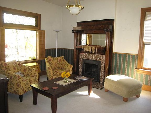 living room with decorative fireplace