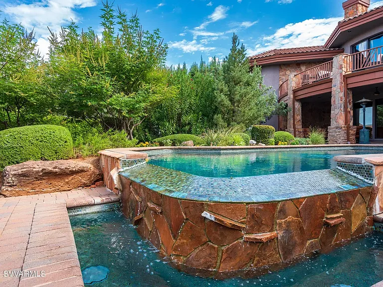 View of Pool Waterfall from the Sunning Area