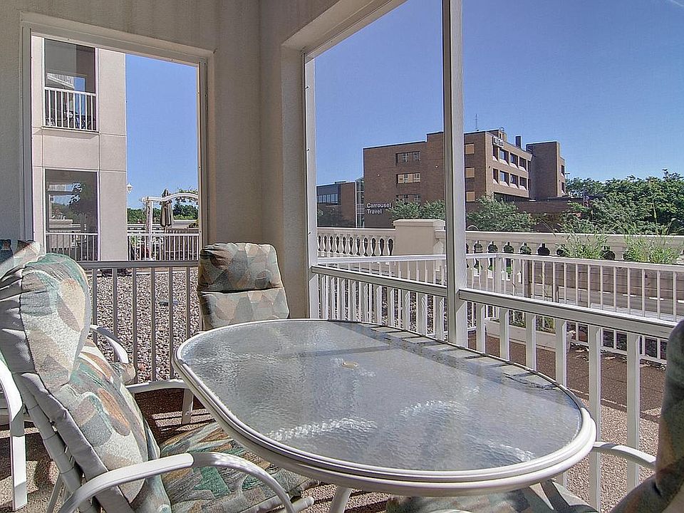 Screen porch off living room adjacent to private balcony!