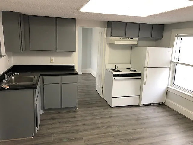Kitchen view upon entry to unit