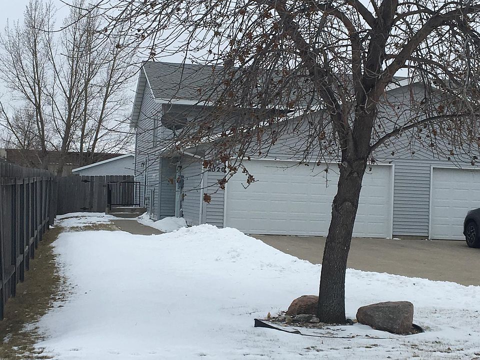 Front yard view. Double stall garage.