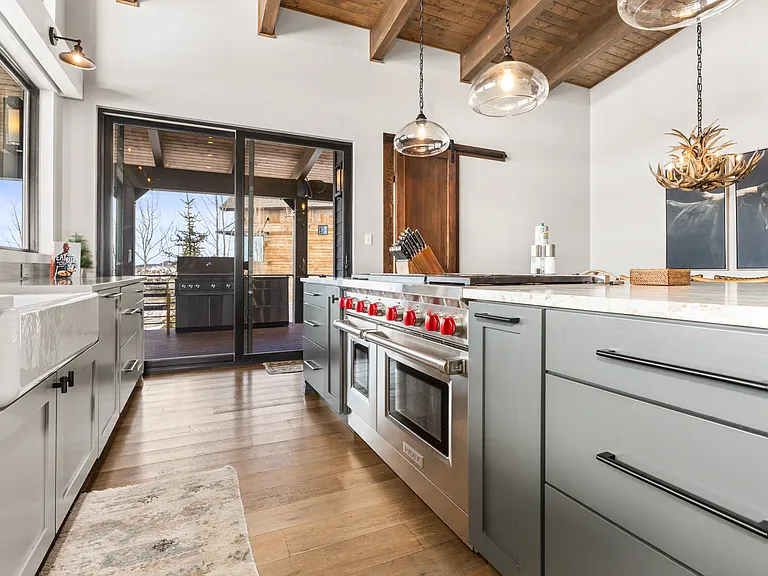 Kitchen with 6 Burner Wolf Gas Stove