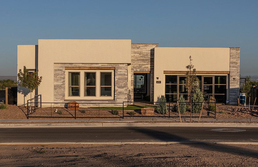 Single story Patagonia shown in Pueblo elevation with stone accents.