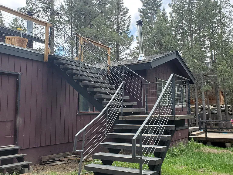 Private staircase to deck and second story