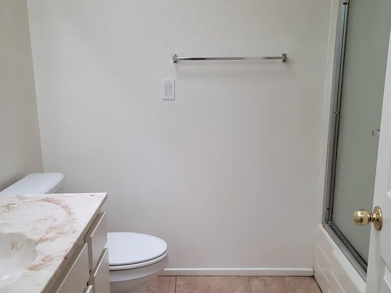 Hallway Bathroom with Bathtub