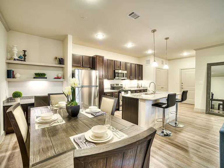 Spacious kitchen, dining area with bar
