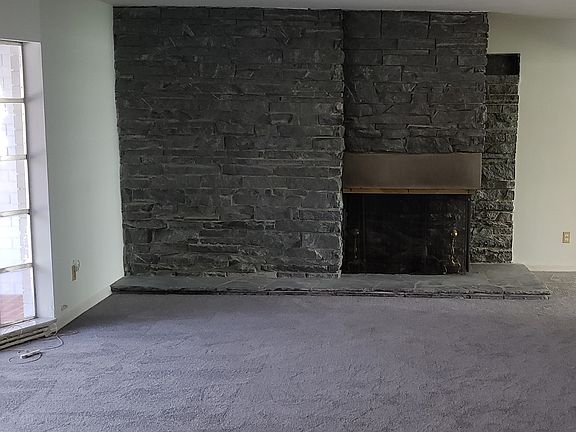 Two sided stone fireplace LR