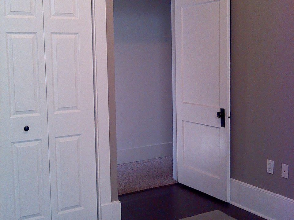 Bedroom closet, doorway to hall